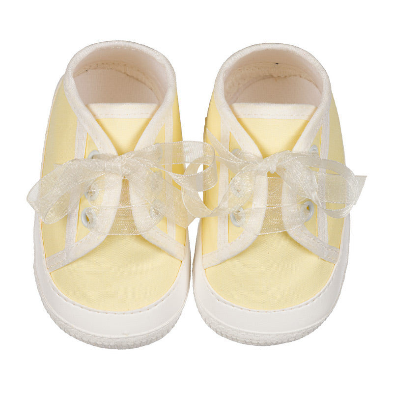 Sneakers gialle con fiocco