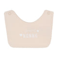 Bavagli off-white e beige con scritta “Amo la nonna/il nonno”.